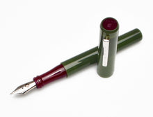 Load image into Gallery viewer, The Franklin-Christoph Model 03 Iterum in Vintage Green Sweet Maroon, capped, rests on a white background.