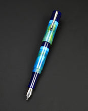 Load image into Gallery viewer, A Franklin-Christoph Model 19 “Kingston SE” fountain pen rests on a dark, solid background.