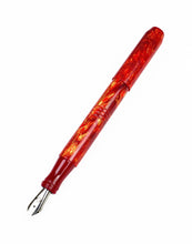 Load image into Gallery viewer, A red fountain pen with a gold marbled pattern and a silver nib, shown diagonally with the cap posted on a plain white background.