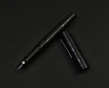 Load image into Gallery viewer, Franklin-Christoph Model 31 Black Pen Society Fountain Pen with engraved details on a dark surface, cap beside it.