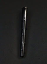 Load image into Gallery viewer, Franklin-Christoph Model 31 Black Pen Society: a Delrin fountain pen with subtle embossing on a black body.