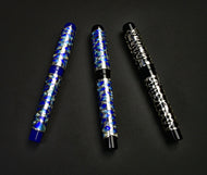 Three Model 03M Onde d’Acqua di Christoph FP pens are arranged diagonally on a plain black surface.