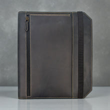 Load image into Gallery viewer, Franklin-Christoph Command Center Padfolio in black boot leather with tan stitching, elastic closure, and zippered pocket.