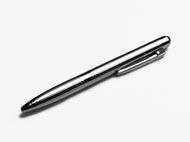 A Franklin-Christoph Model 28 Shortstock Ballpoint – Diamondline with a clip rests on a white surface.