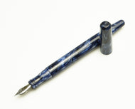 Franklin-Christoph Model 65 Stabilis FP - Galaxy Blue special edition with #5 HP Steel nib, uncapped, shown on a white background.