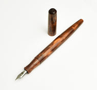 Franklin-Christoph Model 65 Stabilis FP - Southwestern, brown alumilite, silver nib, shown on white background.