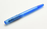 A Franklin-Christoph Model 65 Stabilis Fountain Pen in Maya Blue rests on a white background.