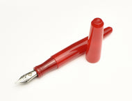 A Franklin-Christoph pocket 66 Fountain Pen in Venetian Red, uncapped, lies elegantly on a white background.